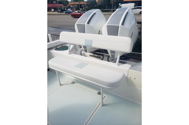 27 Albury Brothers Yacht Photos Pics 2022 Albury Brothers 27 boat with dual engines and white seating.