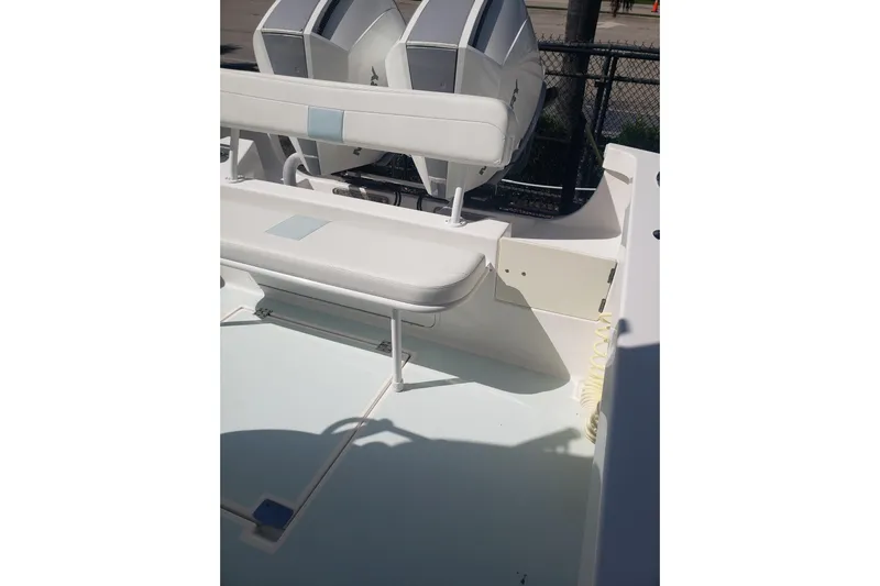 27 Albury Brothers Yacht Photos Pics 2022 Albury Brothers 27 boat interior with seating and dual engines.