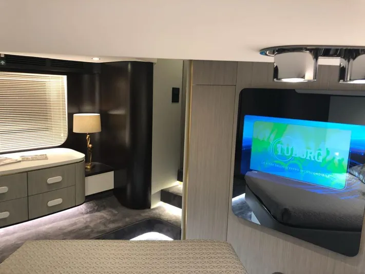  Yacht Photos Pics Luxurious interior of 2018 Azimut 55 yacht with modern furnishings and ambient lighting.