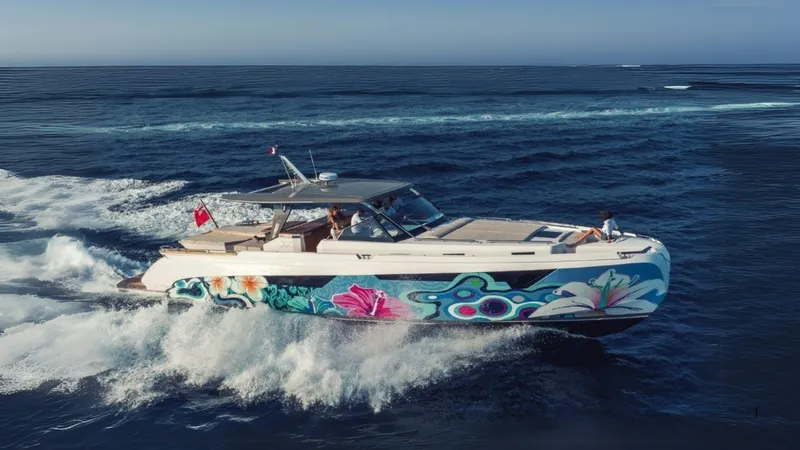  Yacht Photos Pics 2024 Franchini 63 yacht with vibrant floral design cruising on open sea.