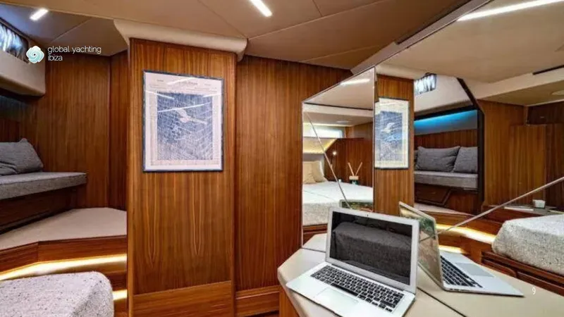  Yacht Photos Pics Luxurious interior of 2024 Franchini 63 yacht with wood paneling and modern amenities.