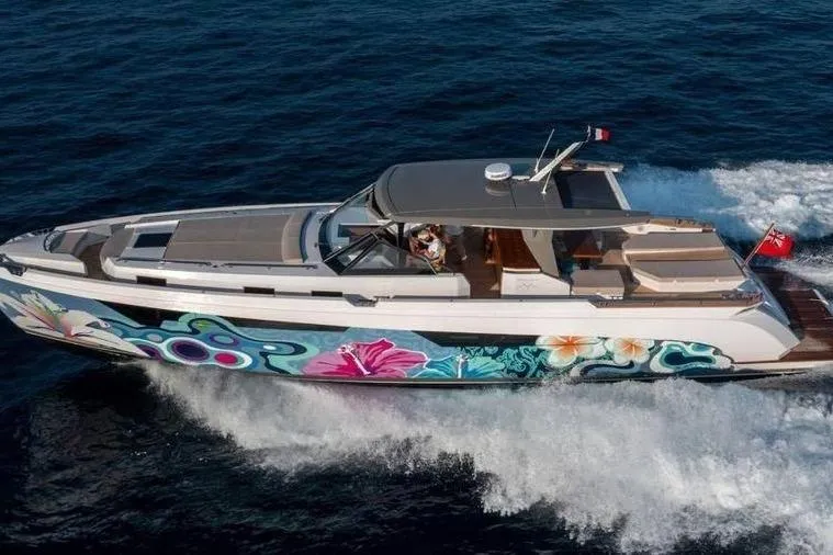  Yacht Photos Pics 2024 Franchini 63 yacht with vibrant floral artwork cruising on the ocean.