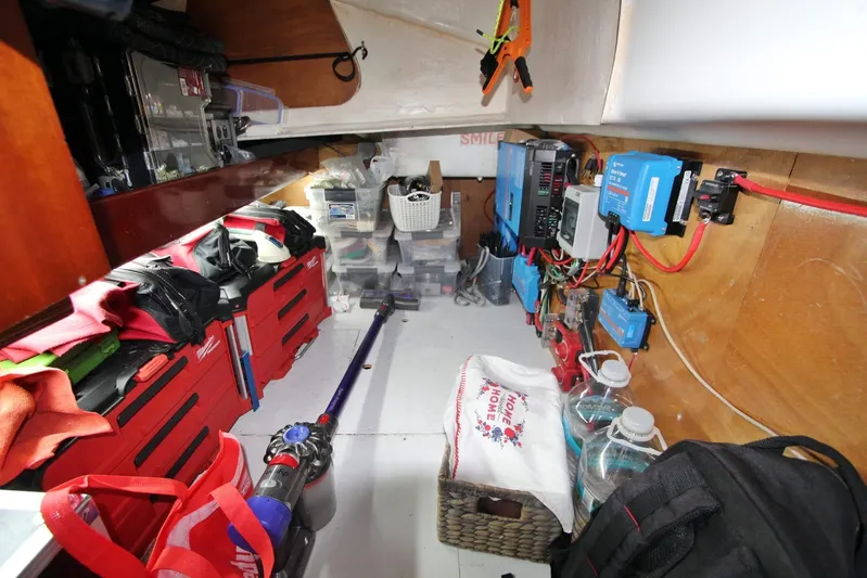  Yacht Photos Pics Interior of a 2003 Beneteau 473 sailboat with organized storage and electrical equipment.