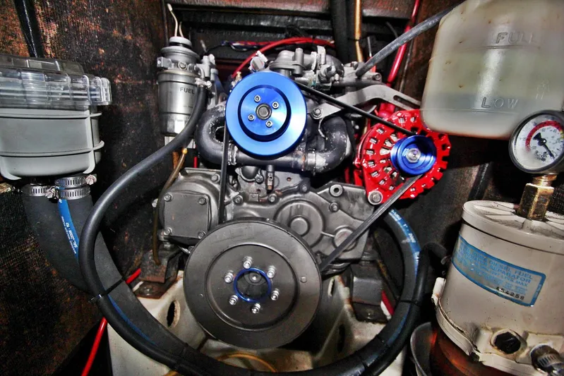  Yacht Photos Pics Engine compartment of a 2003 Beneteau 473 sailboat, showcasing mechanical components.