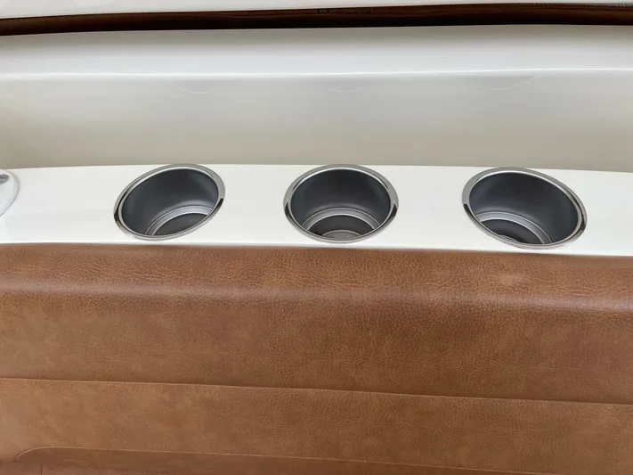  Yacht Photos Pics 2016 Scout 350 LXF boat interior with three stainless steel cup holders.