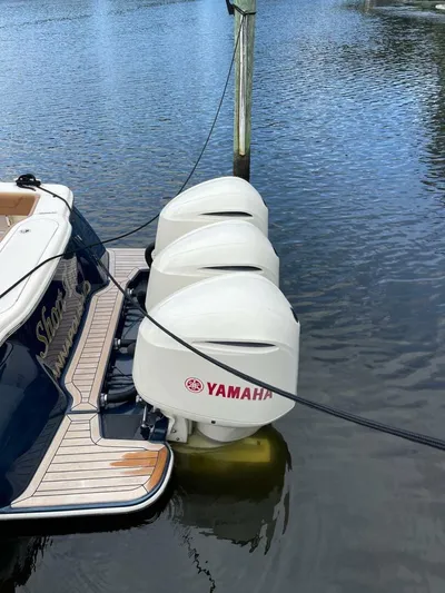  Yacht Photos Pics 2016 Scout 350 LXF boat with Yamaha outboard engines docked on water.