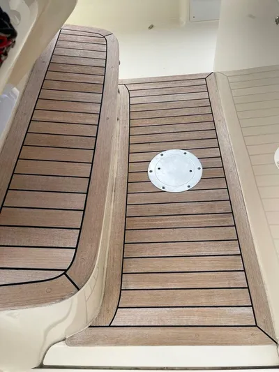  Yacht Photos Pics Teak deck of 2016 Scout 350 LXF boat with circular hatch.