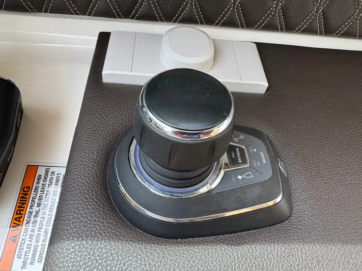  Yacht Photos Pics Joystick control on 2022 Sea Ray SLX 310 boat dashboard.