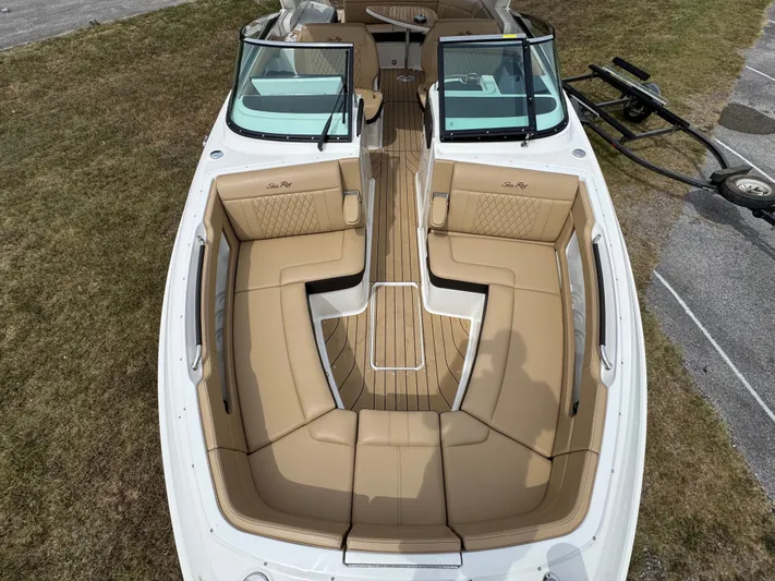  Yacht Photos Pics 2022 Sea Ray SLX 310 boat with tan leather seating and sleek design.