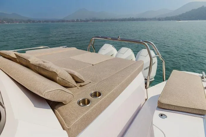  Yacht Photos Pics Luxurious sun deck of the 2024 Axopar 45 XC Cross Cabin on calm waters.