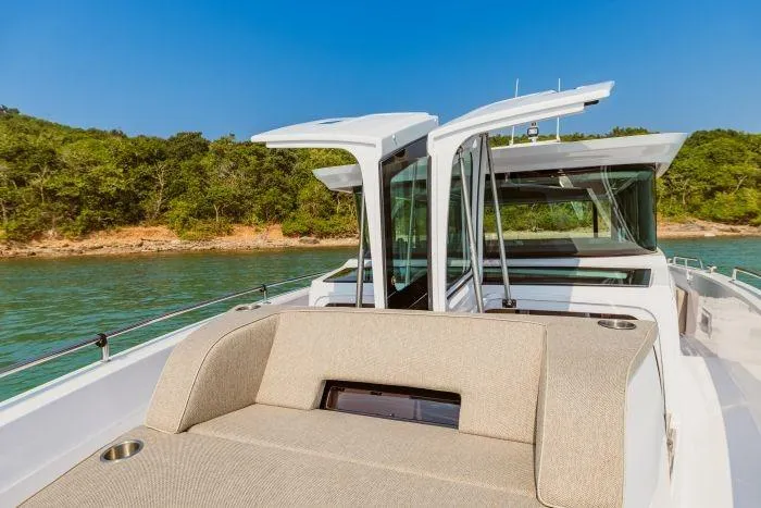  Yacht Photos Pics 2024 Axopar 45 XC Cross Cabin on calm waters.