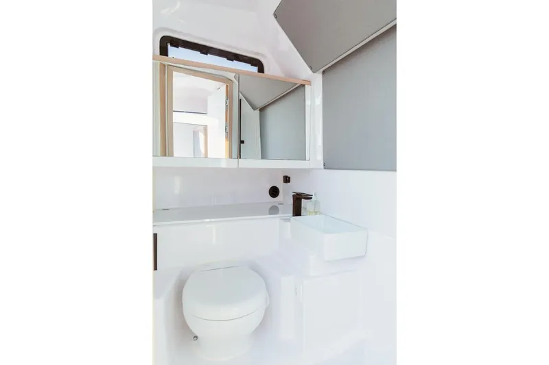  Yacht Photos Pics Interior of Axopar 45 XC Cross Cabin 2024, modern bathroom design.