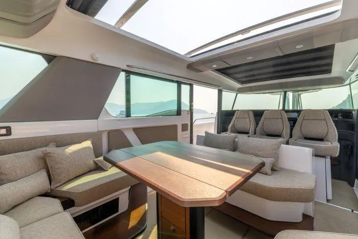  Yacht Photos Pics Interior of 2024 Axopar 45 XC Cross Cabin with luxurious seating area.