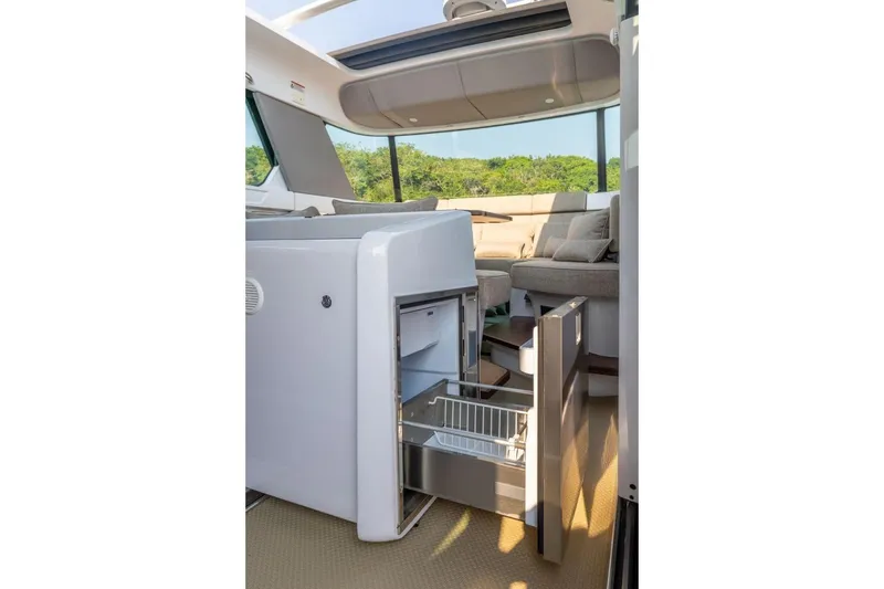  Yacht Photos Pics Interior of 2024 Axopar 45 XC Cross Cabin with open drawer.