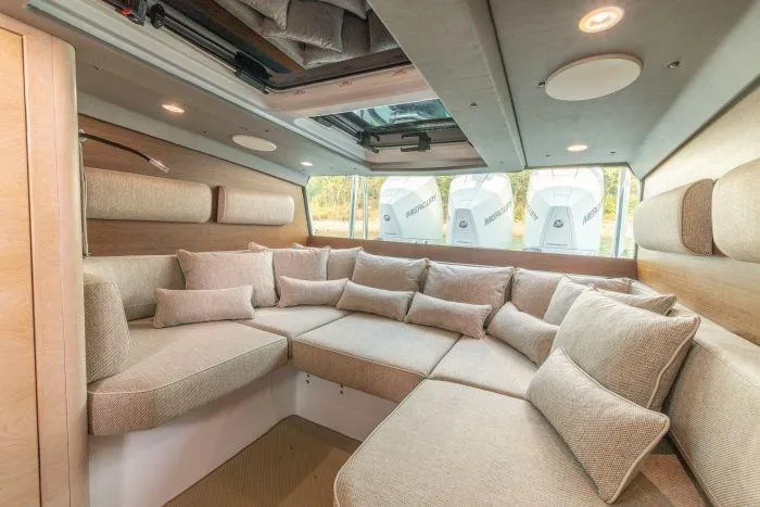  Yacht Photos Pics Interior of 2024 Axopar 45 XC Cross Cabin with cozy seating.