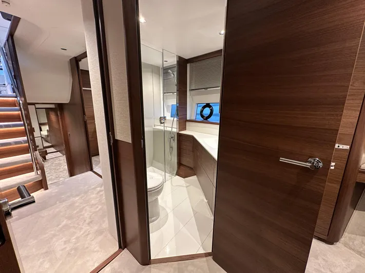F65020 Yacht Photos Pics Luxurious 2024 Princess F65 yacht interior with modern bathroom and elegant wood finishes.