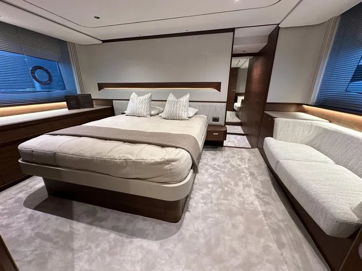 F65020 Yacht Photos Pics Luxurious bedroom interior of 2024 Princess F65 yacht with modern design and elegant furnishings.