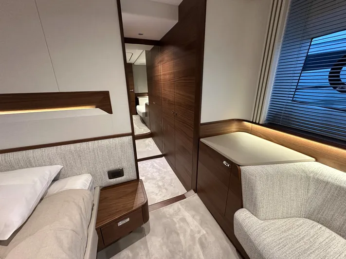 F65020 Yacht Photos Pics Luxurious interior of 2024 Princess F65 yacht, featuring elegant wood finishes and modern design.