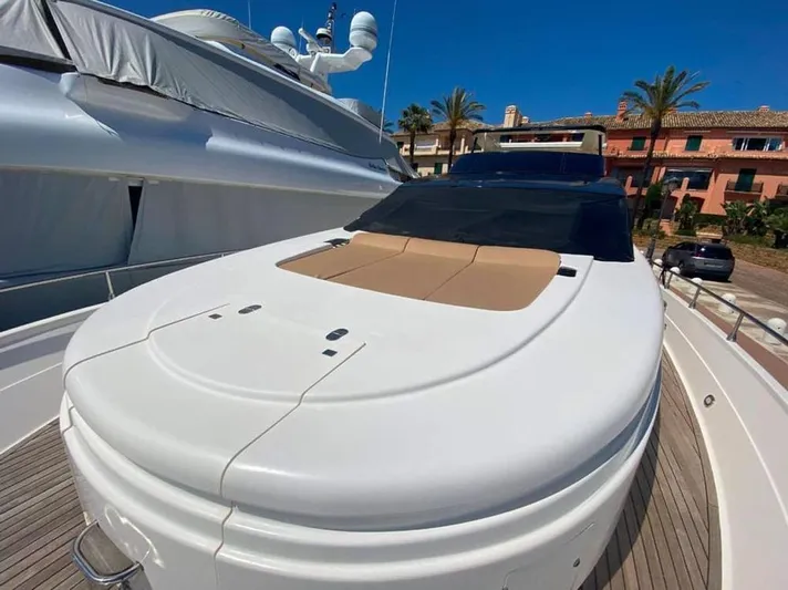 Yaiza Yacht Photos Pics Astondoa 82 GLX yacht, 2000 model, featuring sleek design and sunbathing area.
