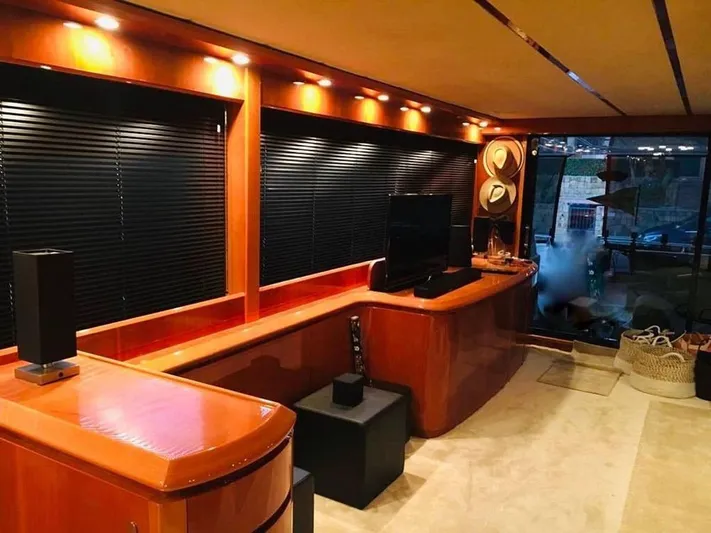 Yaiza Yacht Photos Pics Luxurious interior of 2000 Astondoa 82 GLX yacht with wood finishes and modern amenities.