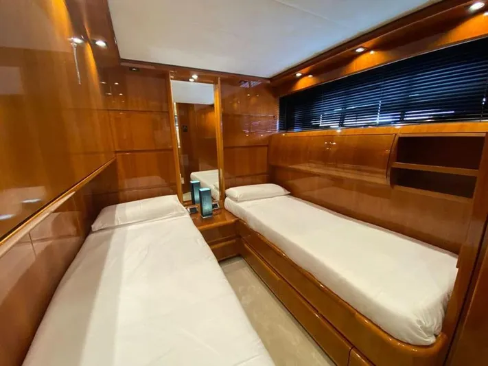 Yaiza Yacht Photos Pics Luxurious twin cabin interior of 2000 Astondoa 82 GLX yacht with wooden finish.