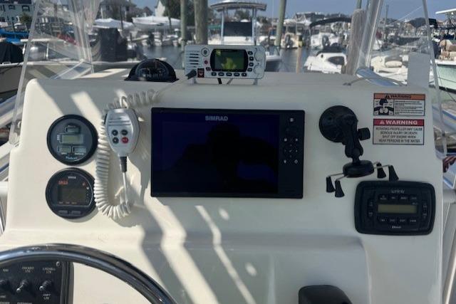 2014 Cobia 217 Center Console dashboard with navigation and communication equipment.