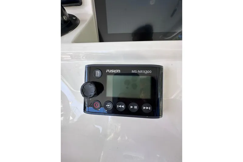No Name Yacht Photos Pics Fusion MS-NRX300 marine stereo on 2020 Intrepid 409 Valor boat dashboard.