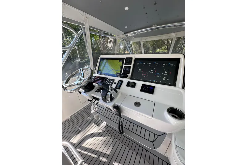 No Name Yacht Photos Pics Cockpit of 2020 Intrepid 409 Valor with advanced navigation and control systems.
