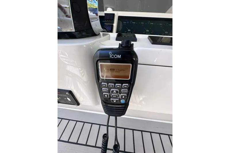 No Name Yacht Photos Pics ICOM marine radio on 2020 Intrepid 409 Valor boat dashboard.