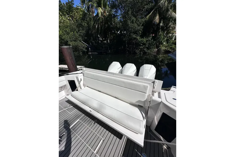 No Name Yacht Photos Pics 2020 Intrepid 409 Valor boat with white seating and triple outboard engines.