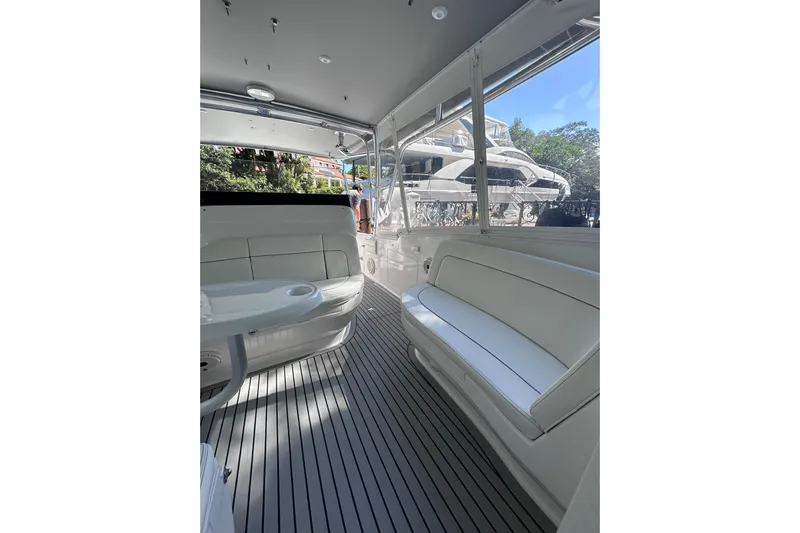 No Name Yacht Photos Pics Interior of 2020 Intrepid 409 Valor boat with white seating and sleek design.