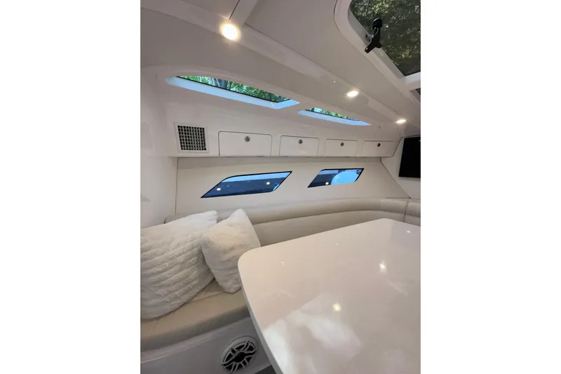 No Name Yacht Photos Pics Luxurious interior of 2020 Intrepid 409 Valor boat with plush seating and modern design.