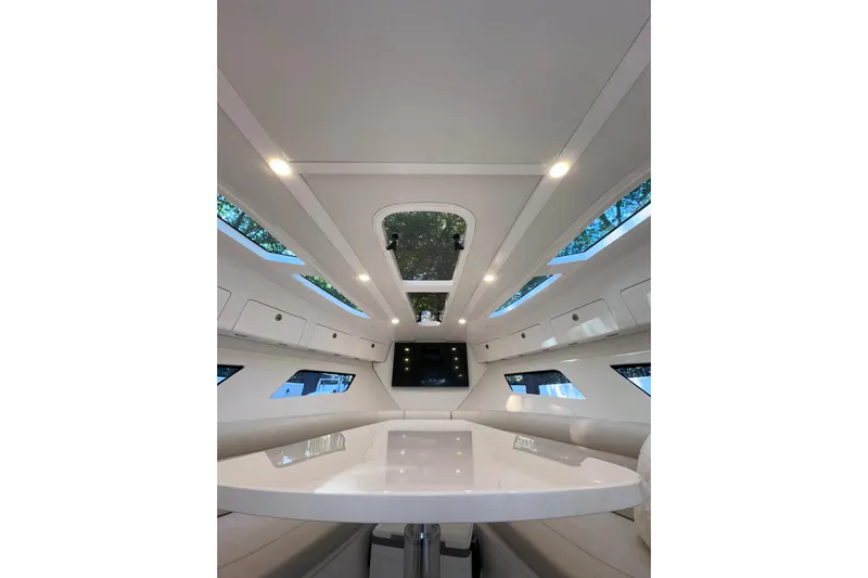 No Name Yacht Photos Pics Luxurious interior of 2020 Intrepid 409 Valor boat with modern design and skylights.