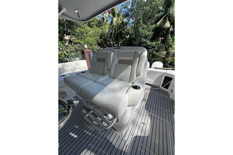 No Name Yacht Photos Pics 2020 Intrepid 409 Valor boat interior with plush seating and sleek design.