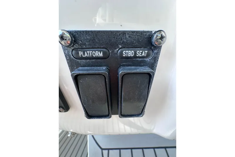 No Name Yacht Photos Pics Control switches on a 2020 Intrepid 409 Valor boat dashboard.