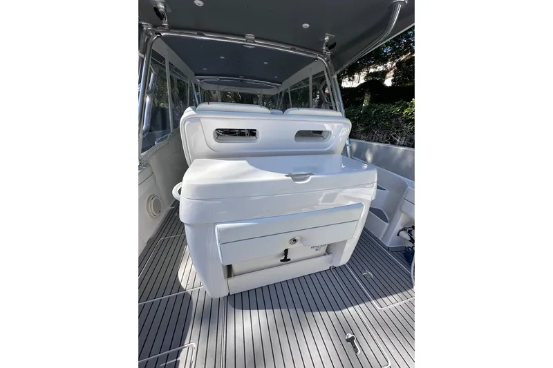 No Name Yacht Photos Pics 2020 Intrepid 409 Valor boat interior with sleek seating and modern design.