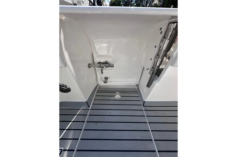 No Name Yacht Photos Pics 2020 Intrepid 409 Valor boat interior with sleek, modern design and stainless steel fixtures.