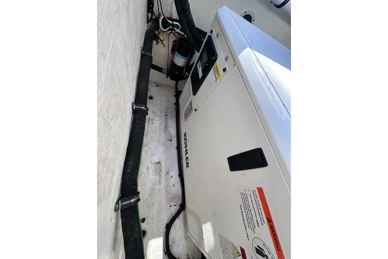 No Name Yacht Photos Pics Engine compartment of 2020 Intrepid 409 Valor with Kohler generator and wiring.