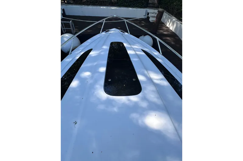 No Name Yacht Photos Pics 2020 Intrepid 409 Valor boat deck with sleek design and railing.