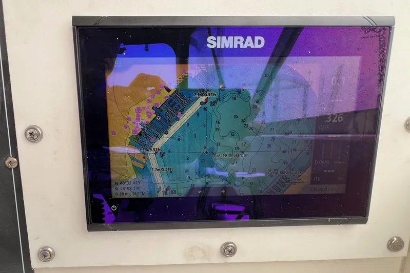 Rock N Reel Yacht Photos Pics Simrad navigation display on 2005 Boston Whaler 305 Conquest boat, showing Great Kills Harbor map.