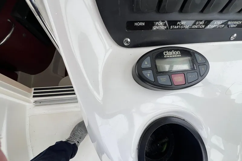 Rock N Reel Yacht Photos Pics 2005 Boston Whaler 305 Conquest dashboard with Clarion marine audio system.