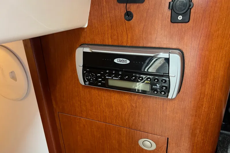 Rock N Reel Yacht Photos Pics Clarion stereo system on 2005 Boston Whaler 305 Conquest boat interior.