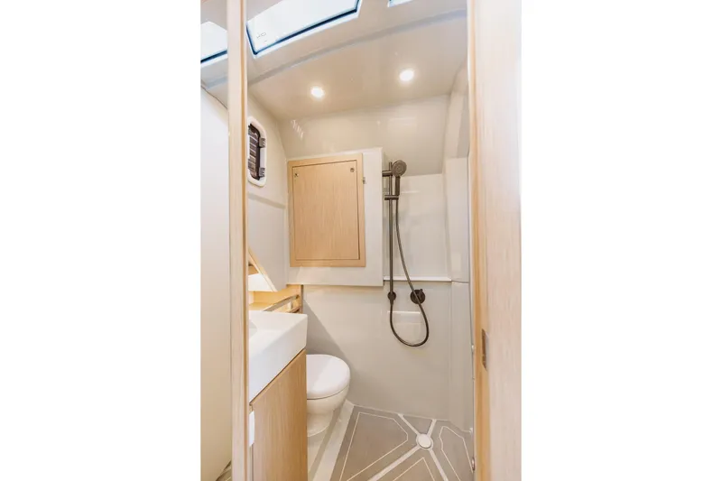  Yacht Photos Pics Modern bathroom in 2026 XO Boats EXPLR 44, featuring sleek design and efficient layout.
