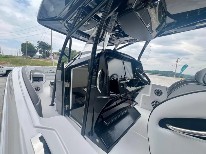  Yacht Photos Pics 2025 Nor-Tech 340 Sport Center Console boat interior with sleek design and modern controls.
