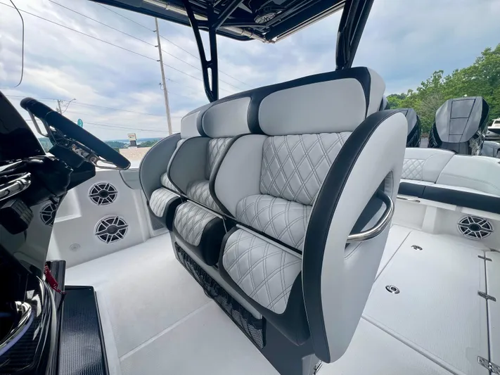  Yacht Photos Pics 2025 Nor-Tech 340 Sport Center Console interior with luxurious seating and modern design.