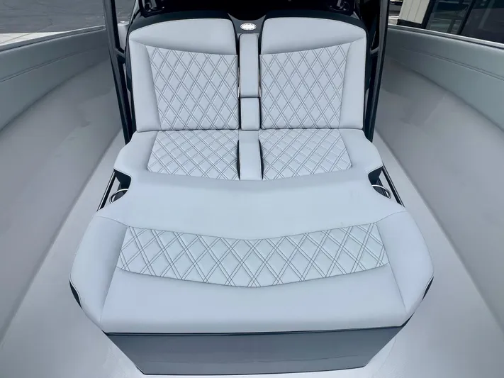  Yacht Photos Pics 2025 Nor-Tech 340 Sport Center Console with luxurious diamond-stitched seating in a sleek design.
