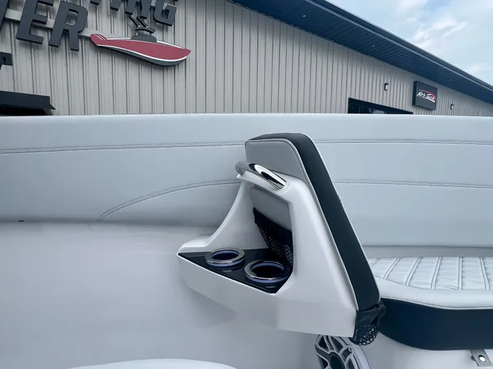  Yacht Photos Pics 2025 Nor-Tech 340 Sport Center Console interior with cup holders and seating detail.