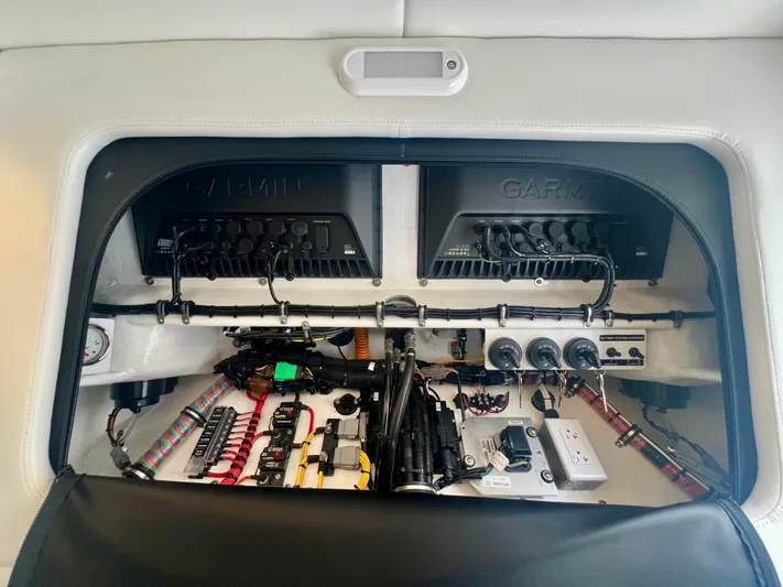  Yacht Photos Pics 2025 Nor-Tech 340 Sport Center Console electronics panel with Garmin systems and wiring.