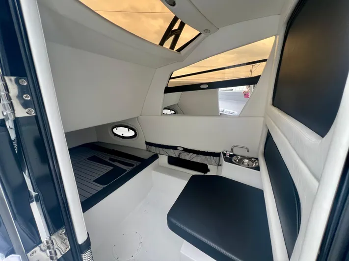  Yacht Photos Pics 2025 Nor-Tech 340 Sport Center Console cabin interior with sleek seating and modern design.