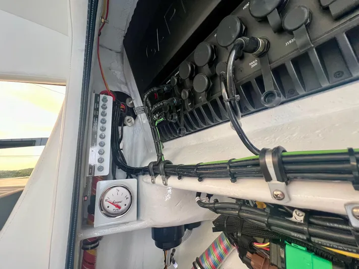  Yacht Photos Pics Interior view of 2025 Nor-Tech 340 Sport Center Console's electrical panel and wiring.